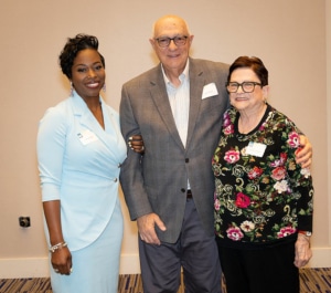 Carolyn Tortorici, her husband and Christel Bell